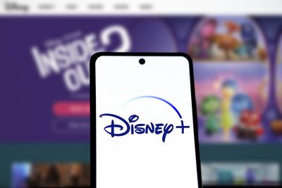 Dhaka,Bangladesh 02 July 2024:Smartphone with Disney+ logo displayed on the screen. Dhaka,Bangladesh 02 July 2024:Smartp-stock-photo