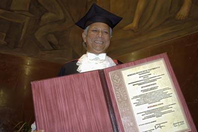 Muhammad Yunus receiving a Doctor Honoris Causa title from Sapienza University in Rome.-stock-photo