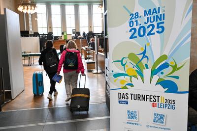 Leipzig - Regen und Gewitter am ersten Tag: Internationales Turnfest startet in Leipzig-stock-photo
