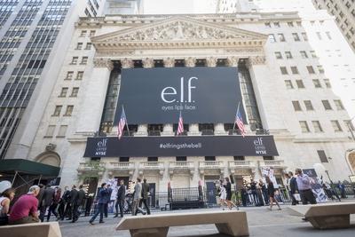 E L F Beauty begins trading on the NYSE The facade of the New York Stock Exchange is decorated for-stock-photo