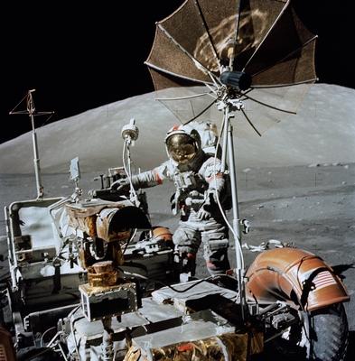 (13 Dec. 1972) --- Astronaut Eugene A. Cernan, Apollo 17 commander, approaches the parked Lunar Roving Vehicle (LRV) on-stock-photo