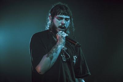 Post Malone The American rapper and lyricist Post Malone performs a live concert at Pumpehuset in Copenhagen. Denmark, 1-stock-foto