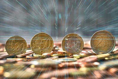 Bavaria, Germany - May 20, 2025: PHOTOMONTAGE, symbol for the digital euro - euro coins on a stack of small change, cris-stock-foto