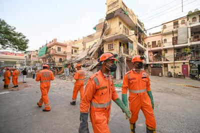 Three Storey Building Collapses In Rohini Area Of Delhi-stock-photo