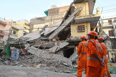 Three Storey Building Collapses In Rohini Area Of Delhi-stock-photo