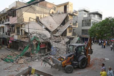 Three Storey Building Collapses In Rohini Area Of Delhi-stock-photo