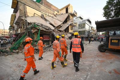 Three Storey Building Collapses In Rohini Area Of Delhi-stock-photo