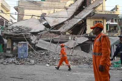 Three Storey Building Collapses In Rohini Area Of Delhi-stock-photo