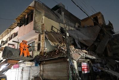 Three Storey Building Collapses In Rohini Area Of Delhi-stock-photo