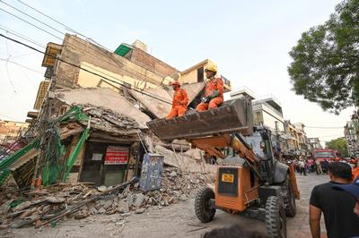 Three Storey Building Collapses In Rohini Area Of Delhi-stock-photo