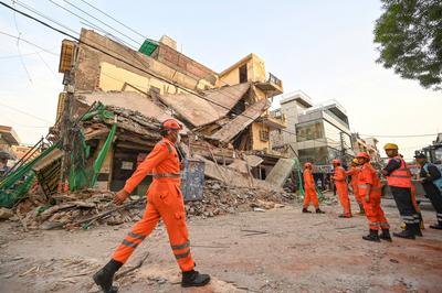 Three Storey Building Collapses In Rohini Area Of Delhi-stock-photo