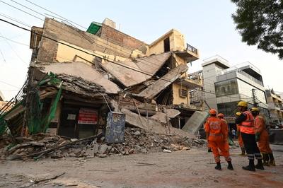 Three Storey Building Collapses In Rohini Area Of Delhi-stock-photo