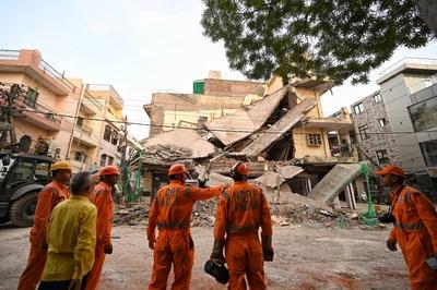 Three Storey Building Collapses In Rohini Area Of Delhi-stock-photo