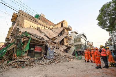 Three Storey Building Collapses In Rohini Area Of Delhi-stock-photo