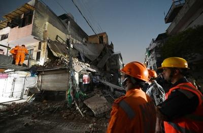 Three Storey Building Collapses In Rohini Area Of Delhi-stock-photo