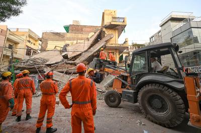 Three Storey Building Collapses In Rohini Area Of Delhi-stock-photo