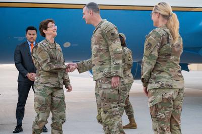 RECORD DATE NOT STATED U.S. Air Force Gen. Jacqueline Van Ovost, commander of U.S. Transportation Command, left, shakes-stock-photo