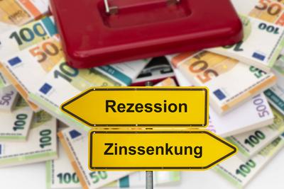 Rezession vs. Zinssenkung-stock-foto
