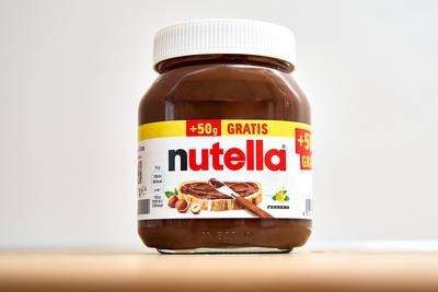 Bavaria, Germany - March 16, 2025: A jar of Nutella from Ferrero with a free 50g label. The well-known hazelnut chocolat-stock-photo