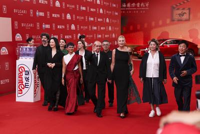 SHANGHAI, CHINA - JUNE 14: 27th SIFF Golden Goblet Awards Jury members director Yang Lina, actress Yong Mei, director Iv-stock-photo