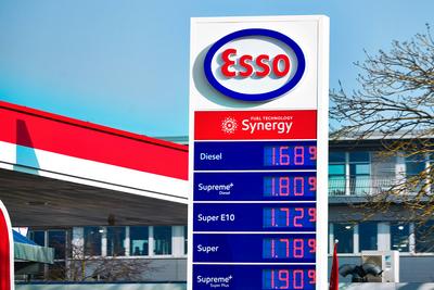 Munich, Bavaria, Germany - February 20, 2025: An Esso filling station with a price board for diesel, Super E10 and Super-stock-foto