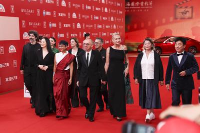 SHANGHAI, CHINA - JUNE 14: 27th SIFF Golden Goblet Awards Jury members director Yang Lina, actress Yong Mei, director Iv-stock-photo