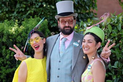 Royal Ascot, Fashion, women and man with hats on Ladies Day at the racecourse-stock-photo