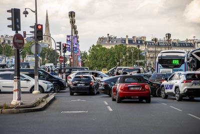 Paris, France - July 13, 2024: Traffic jam at an intersection in the French capital Paris. Symbolic image of traffic vol-stock-foto