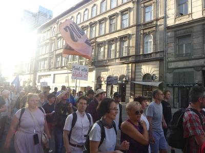 Hungarians and lgbt supporters protest hungary's new anti lgbt+ law in front of parliament.-stock-photo