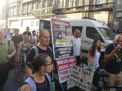 Hungarians and lgbt supporters protest hungary's new anti lgbt+ law in front of parliament.-stock-photo
