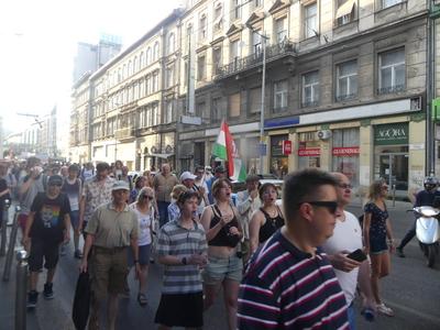 Hungarians and lgbt supporters protest hungary's new anti lgbt+ law in front of parliament.-stock-photo
