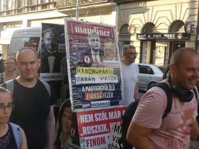 Hungarians and lgbt supporters protest hungary's new anti lgbt+ law in front of parliament.-stock-photo