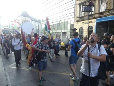 Hungarians and lgbt supporters protest hungary's new anti lgbt+ law in front of parliament.-stock-photo