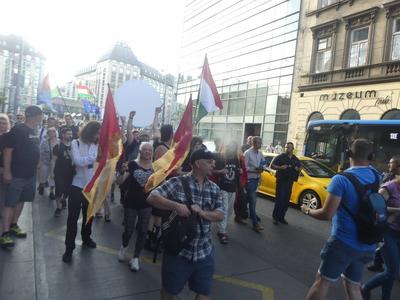 Hungarians and lgbt supporters protest hungary's new anti lgbt+ law in front of parliament.-stock-photo