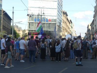 Hungarians and lgbt supporters protest hungary's new anti lgbt+ law in front of parliament.-stock-photo