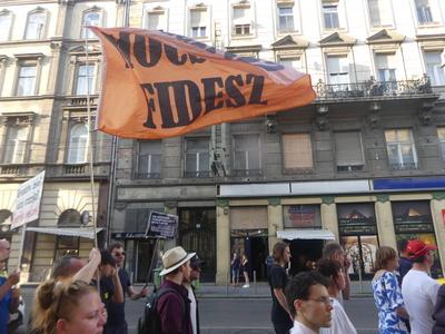 Hungarians and lgbt supporters protest hungary's new anti lgbt+ law in front of parliament.-stock-photo
