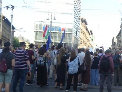 Hungarians and lgbt supporters protest hungary's new anti lgbt+ law in front of parliament.-stock-photo