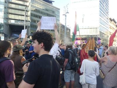 Hungarians and lgbt supporters protest hungary's new anti lgbt+ law in front of parliament.-stock-photo