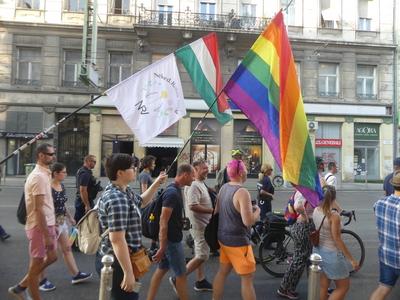 Hungarians and lgbt supporters protest hungary's new anti lgbt+ law in front of parliament.-stock-photo