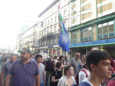 Hungarians and lgbt supporters protest hungary's new anti lgbt+ law in front of parliament.-stock-photo