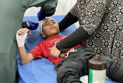 Palestinian casualties are brought to Al-Awda Hospital, following what the Gaza Health Ministry-stock-foto