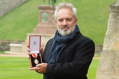 . 30/11/2021. Windsor, United Kingdom. Film Director Sir Sam Mendes with his Knighthood after an Investiture at Windsor-stock-photo