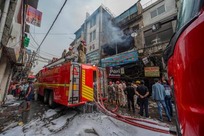 Massive Fire Breaks Out At Commercial Building In Delhi's Sadar Bazaar-stock-photo