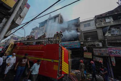 Massive Fire Breaks Out At Commercial Building In Delhi's Sadar Bazaar-stock-photo