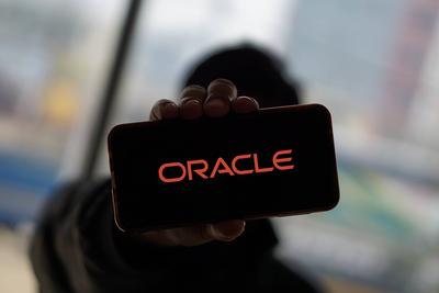ORACLE logo displayed on smartphone screen. ORACLE is a multinational computer technology corporation-Dhaka,Bangladesh 2-stock-foto