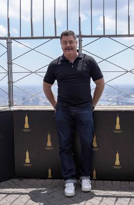 Natasha lyonne, nick offerman & john goodman illuminated the empire state building for smurfs premiere-stock-photo