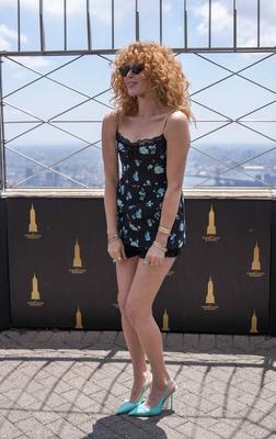Natasha lyonne, nick offerman & john goodman illuminated the empire state building for smurfs premiere-stock-photo