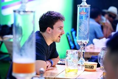 QINGDAO, CHINA - JULY 18: Visitors have fun during the 35th Qingdao International Beer Festival at the Xihai an (West Co-stock-photo