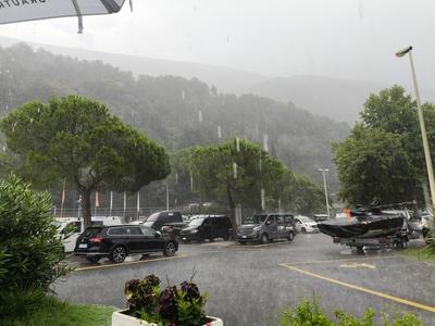 Nago-Torbole, Trentino, Italy - July 21, 2025: Storm on Lake Garda with extreme rainfall and thunderstorms. Heavy rainfa-stock-foto