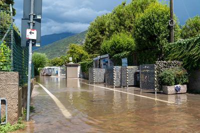 Nago-Torbole, Trentino, Italy - July 21, 2025: Storm on Lake Garda with extreme rainfall and thunderstorms. Flooding on-stock-foto